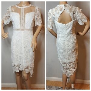 NIKIBIKI White crochet lace short sleeve dress.  Size medium.